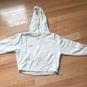 Nike cropped cream hooded sweatshirt with zip front pocket